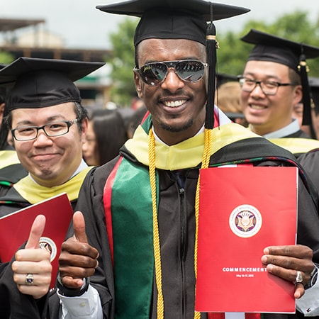 students in cap and gown