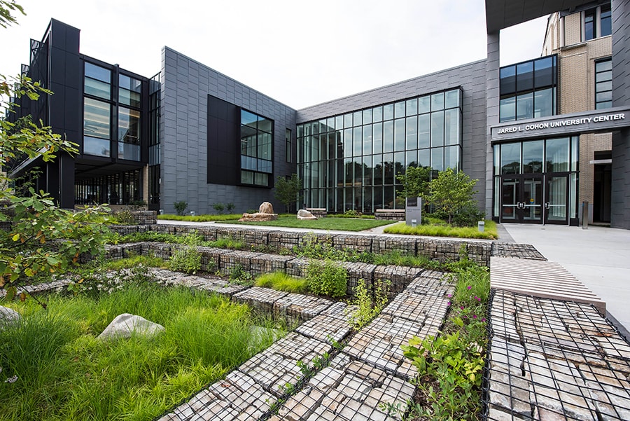 Photo of the Rain Gardens with view of the entrance to Cohon Center
