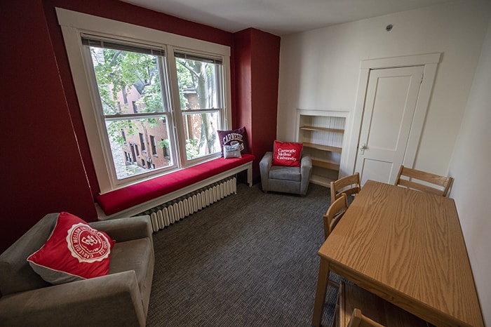 Spirit House Study Room - table chairs CMU pillows and windows