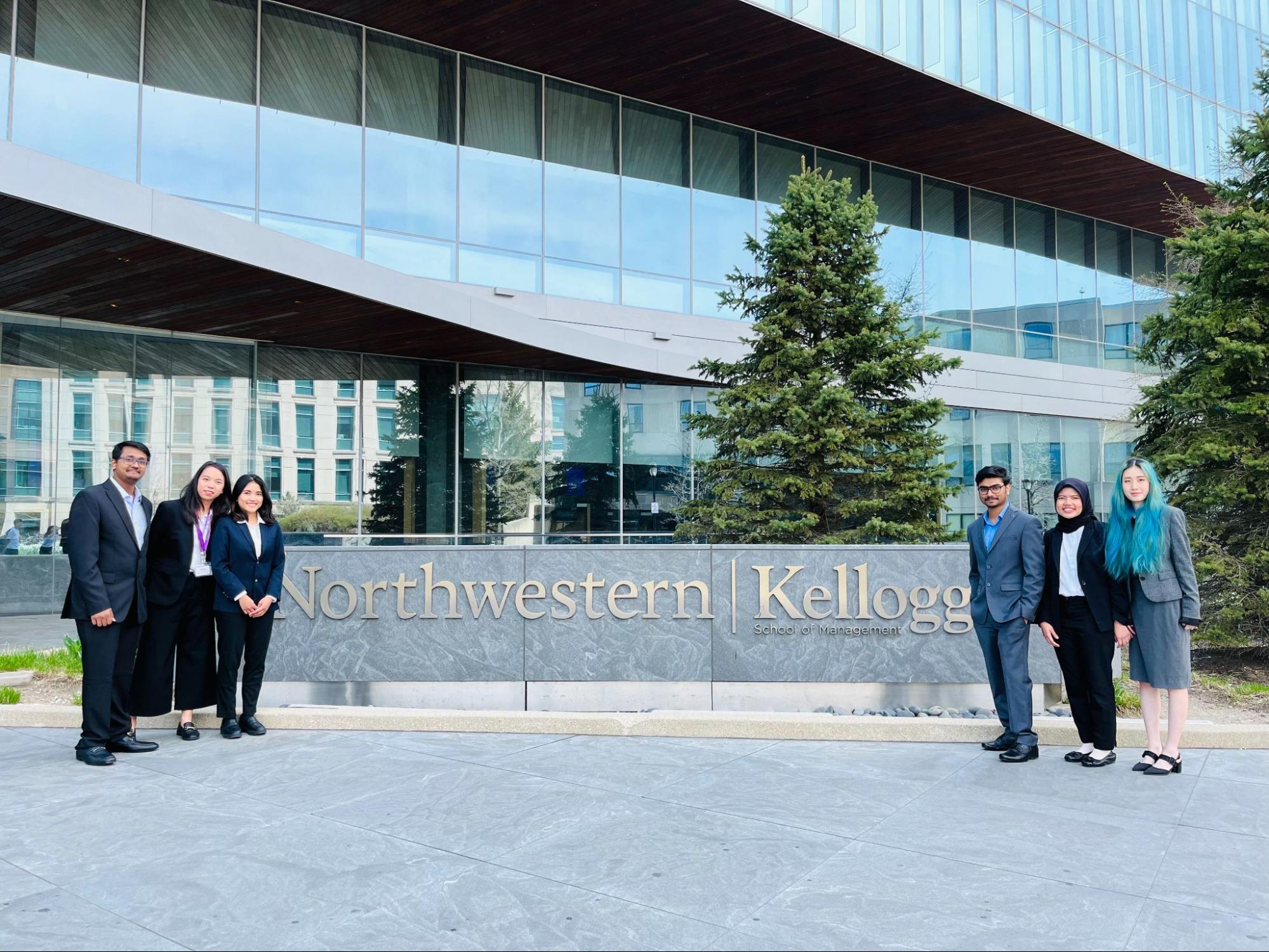 CMU's team stands outside of Northwestern University