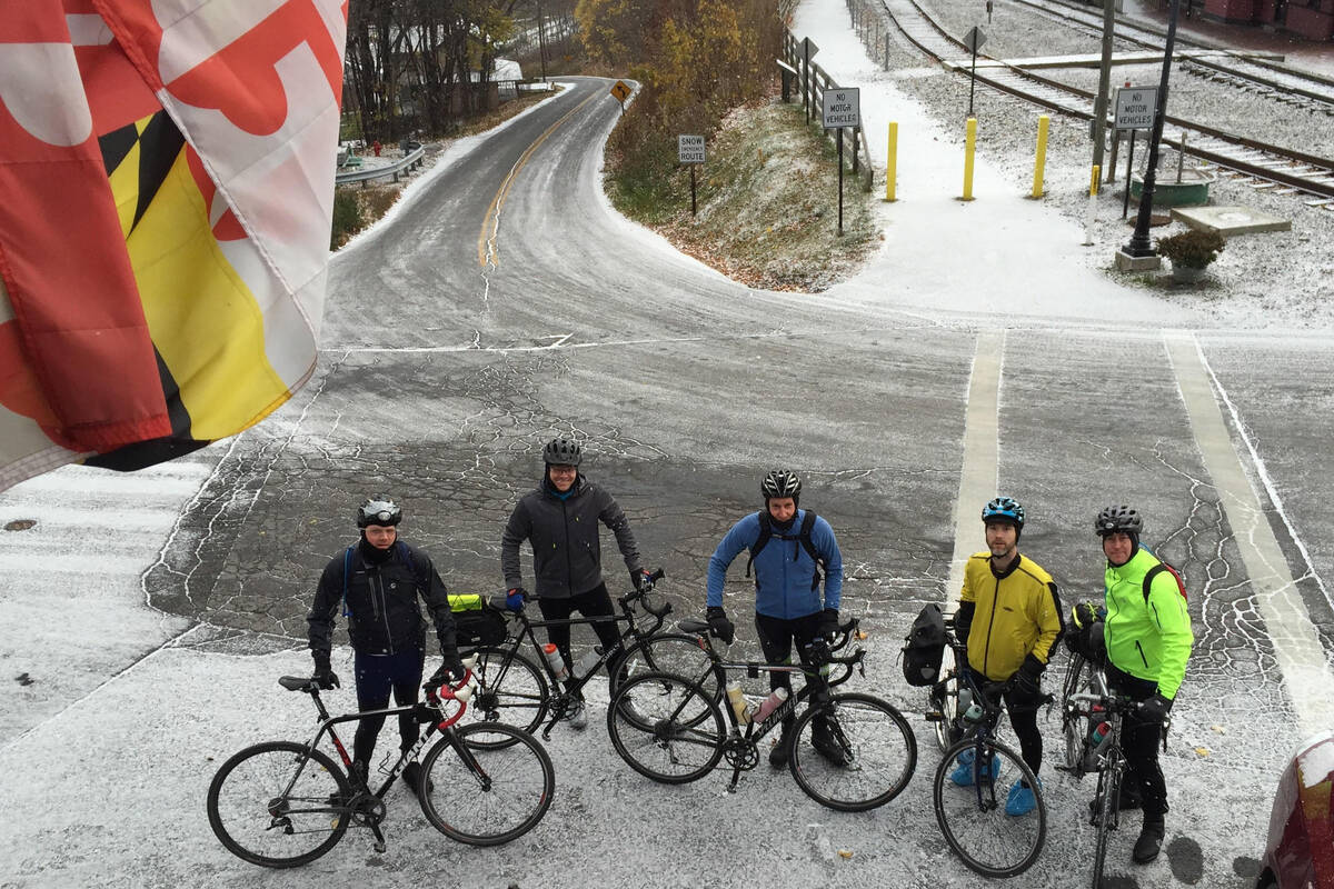 Matt Smith poses with other CNBC members on a bike ride.