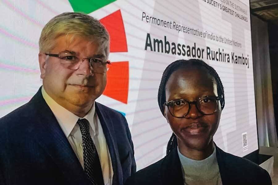 Dean Sanders and Choukouriyah Arinloye at the United Nations briefing.