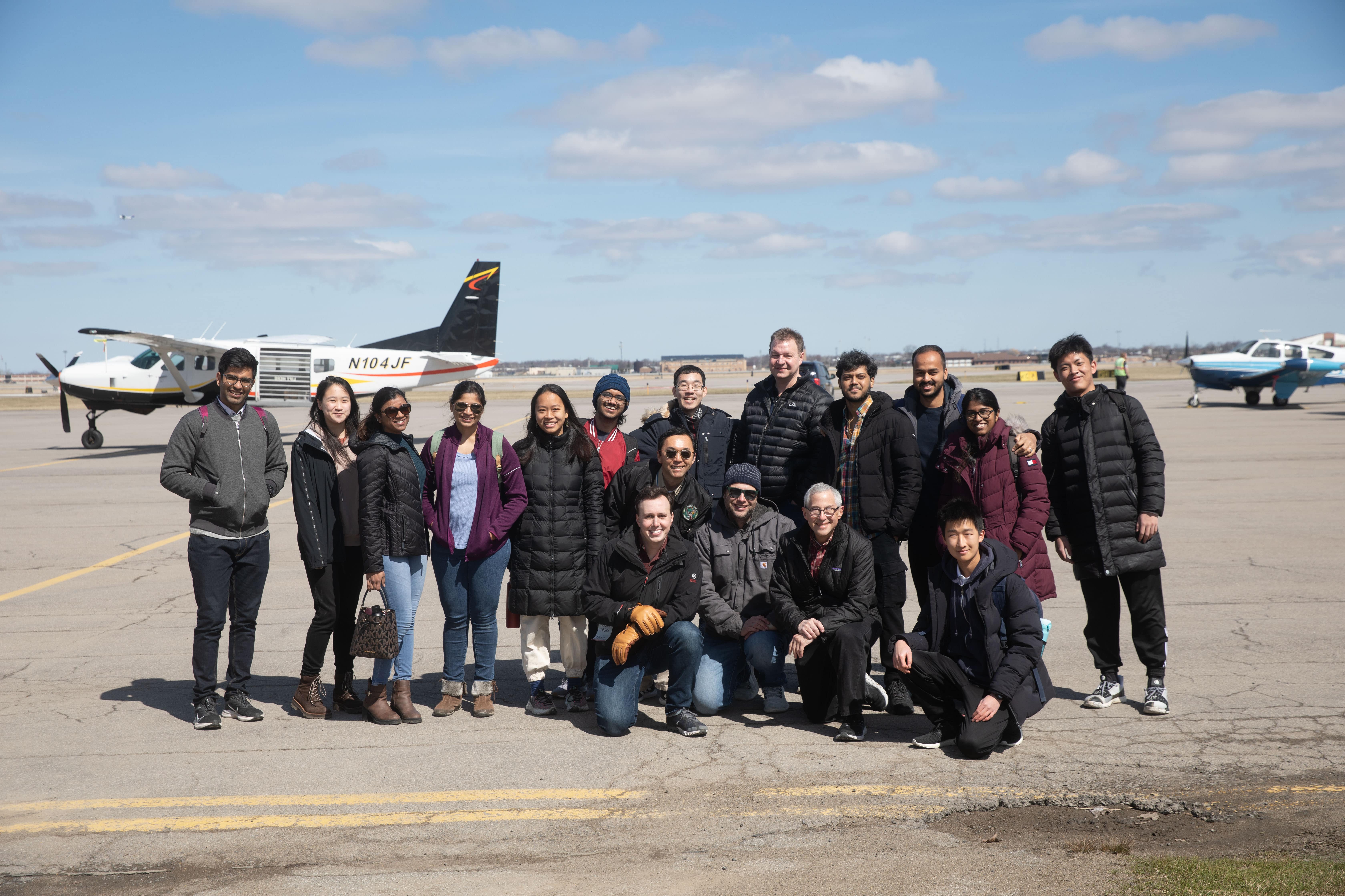 Flying Club members on the tarmac including Jay Apt