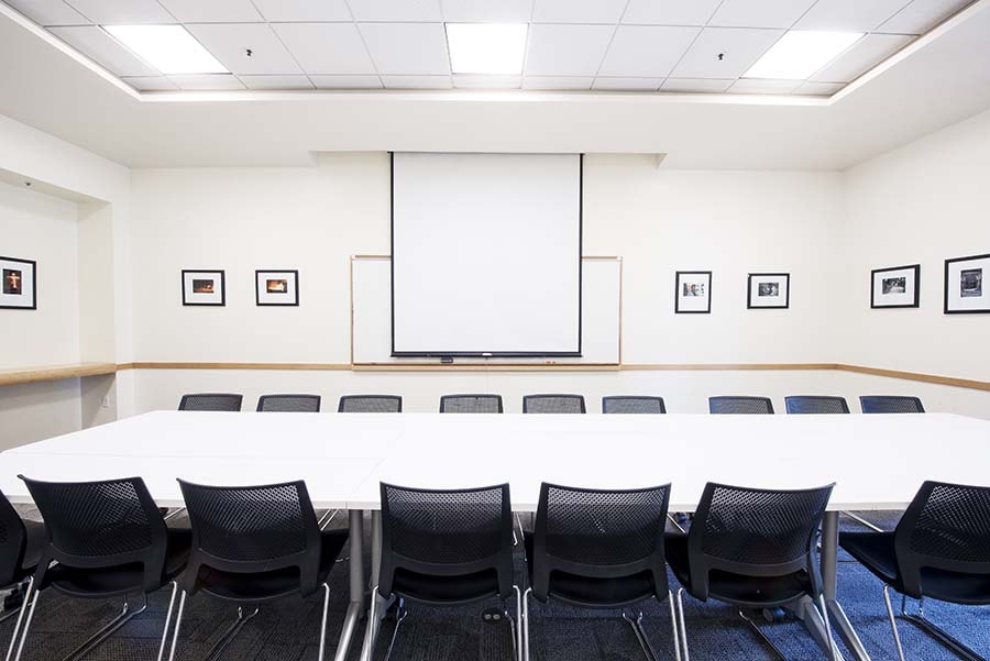 Photo of the Dowd Room facing the projection screen