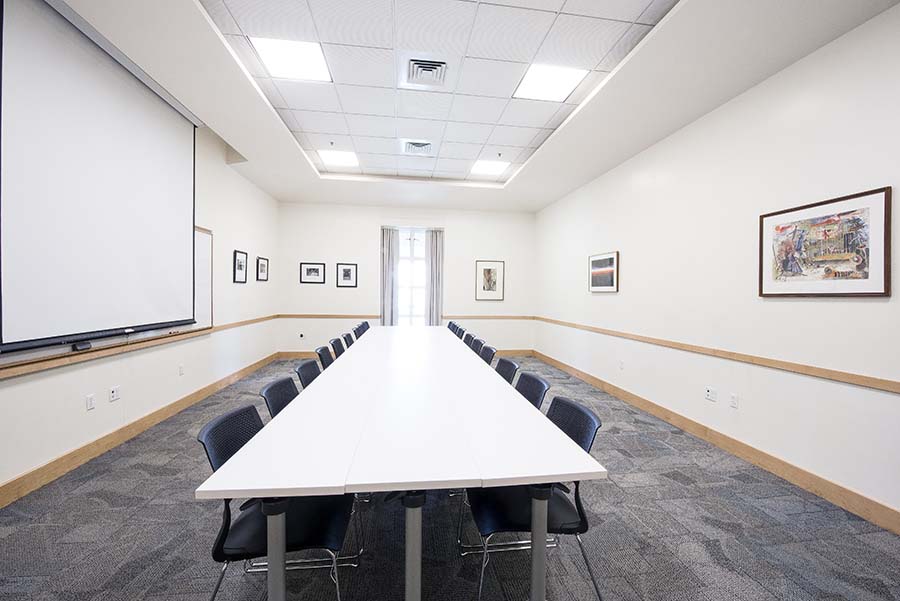 Photo of the Dowd Room from the end of the end of the conference table