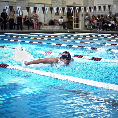 Photo of Swimming and Diving Pool featuring swimmer in lane