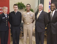 From left-right: RDML Diane Webber, LCDR Brian Evans, CDR James Adkisson, Rick Lanchantin, and Tokunbo Davies