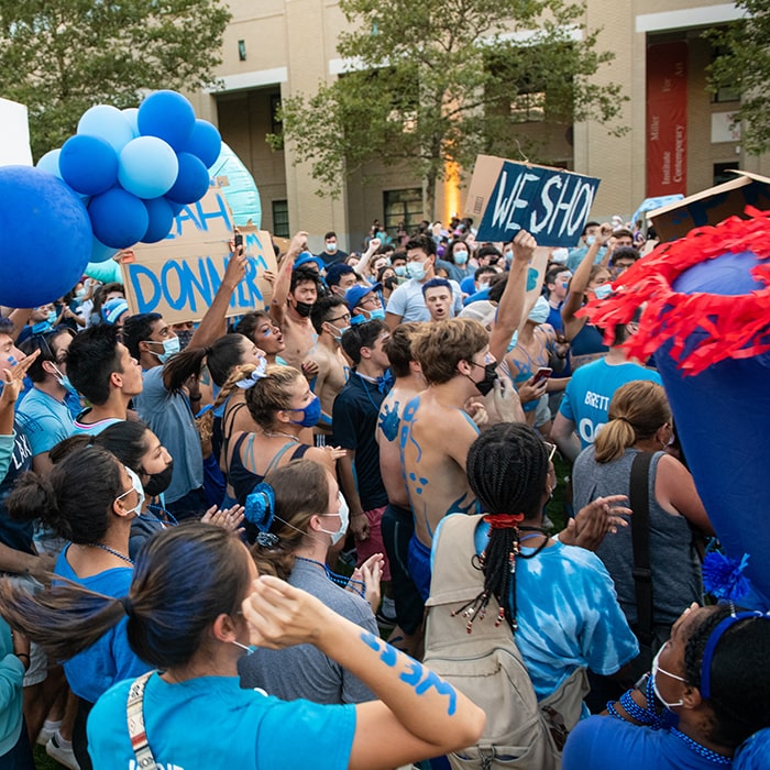 student dressed in blue for house wars