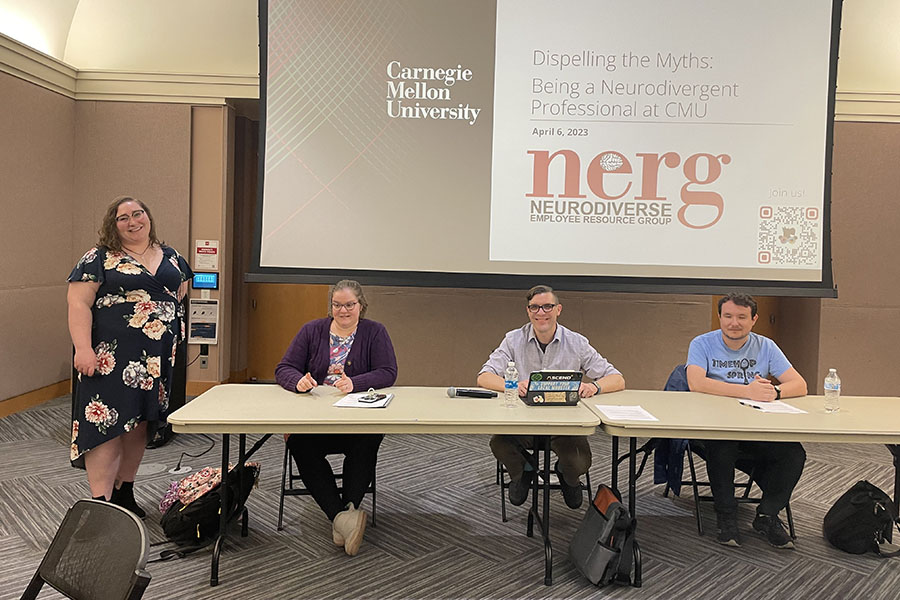 Neurodiverse ERG co-leads and panelists during May panel in front of slide that says Dispelling the Myths: Being a Neurodivergent Professional at CMU