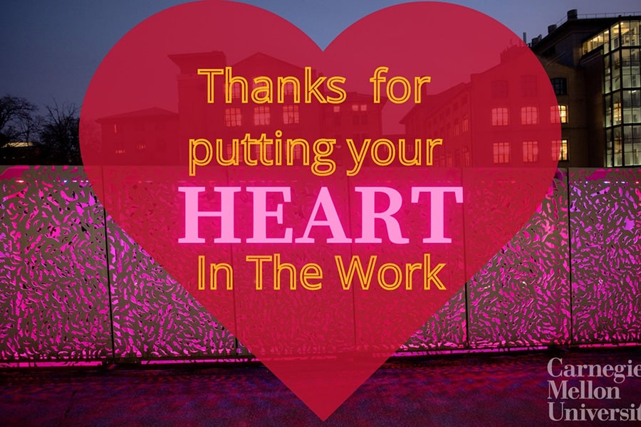 Red heart with the words "Thanks for putting your heart in the work" written on it in white in the center