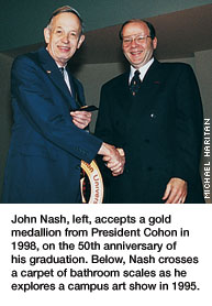 John Nash accepts gold medallion from president Cohon