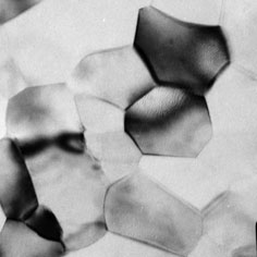 The polycrystalline structure of a material evolves through a series of changes between the grain boundaries.