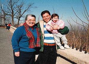photo of Beth Jones, Aaron Mitchell, and his daughter Hannah as a child