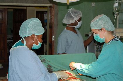 photo of Krista at operating table in Kenya