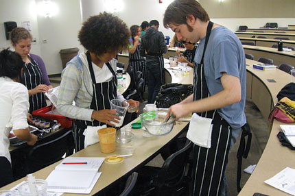 photo of students making soup-filled spheres