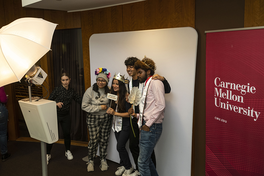 students have fun at a photobooth