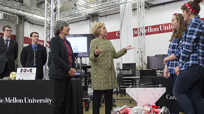Candidate Clinton talks to members of the Girls of Steel