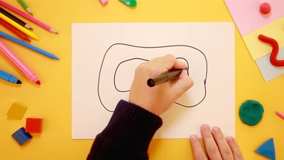 childs hands drawing