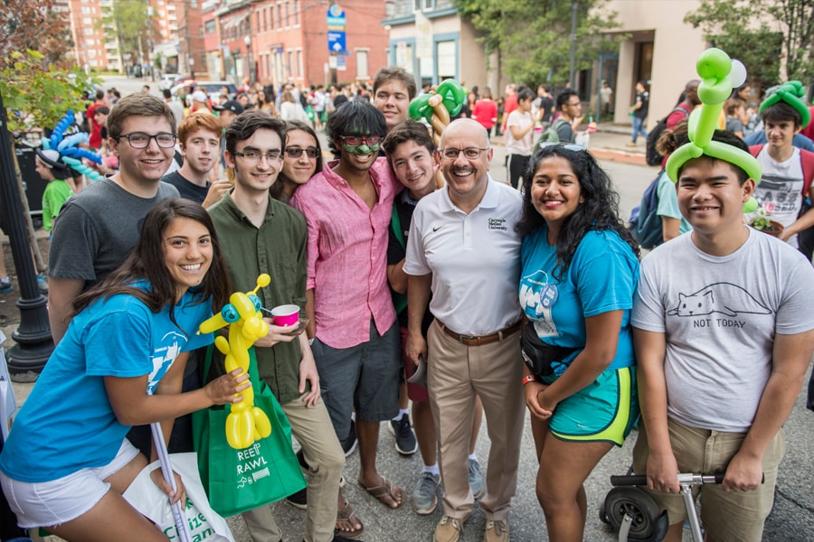 Image of students with President Jahanian