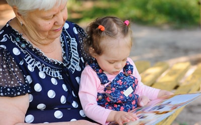 image of a grandmother and grandchild sitting together