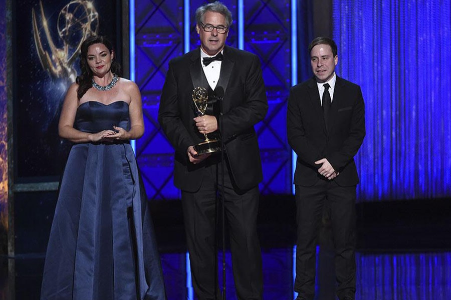 Image of VEEP production design team on stage receiving Emmys