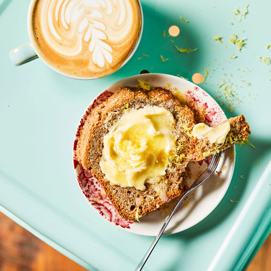 Image of breakfast food on blue tabletop