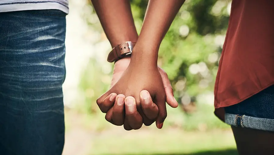 human-chain-hands-image-bj-900x600-min.jpg