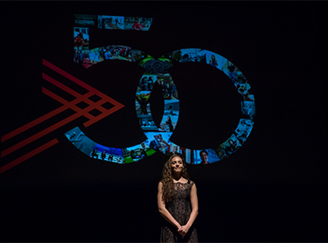 Female student speaking at Convocation