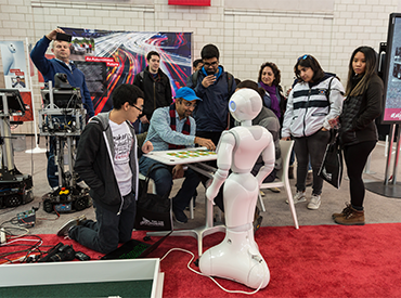 Robot playing Go Fish at Expo