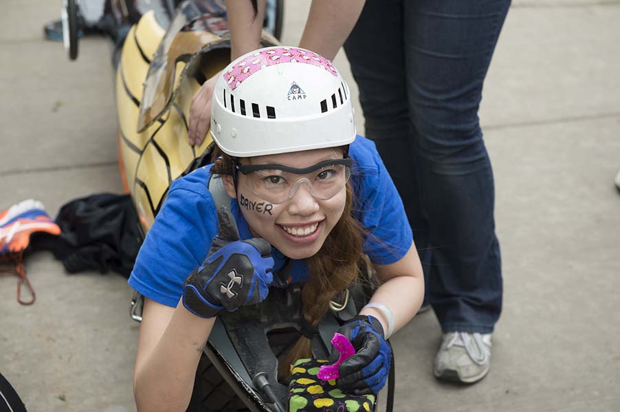 A student pushing buggy in the final races.