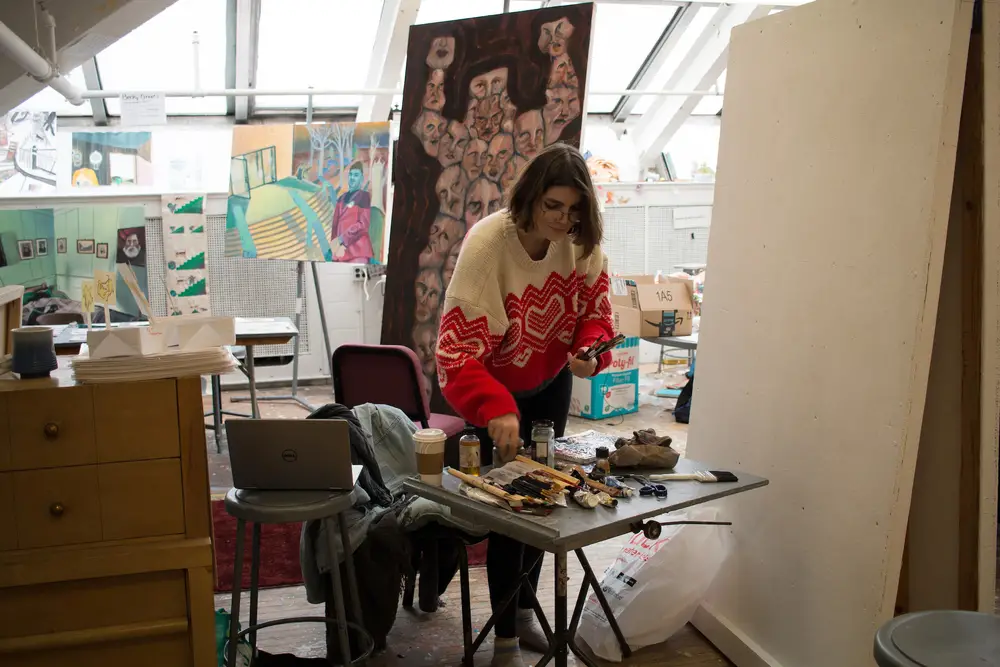 Art student working in her dedicated studio space.