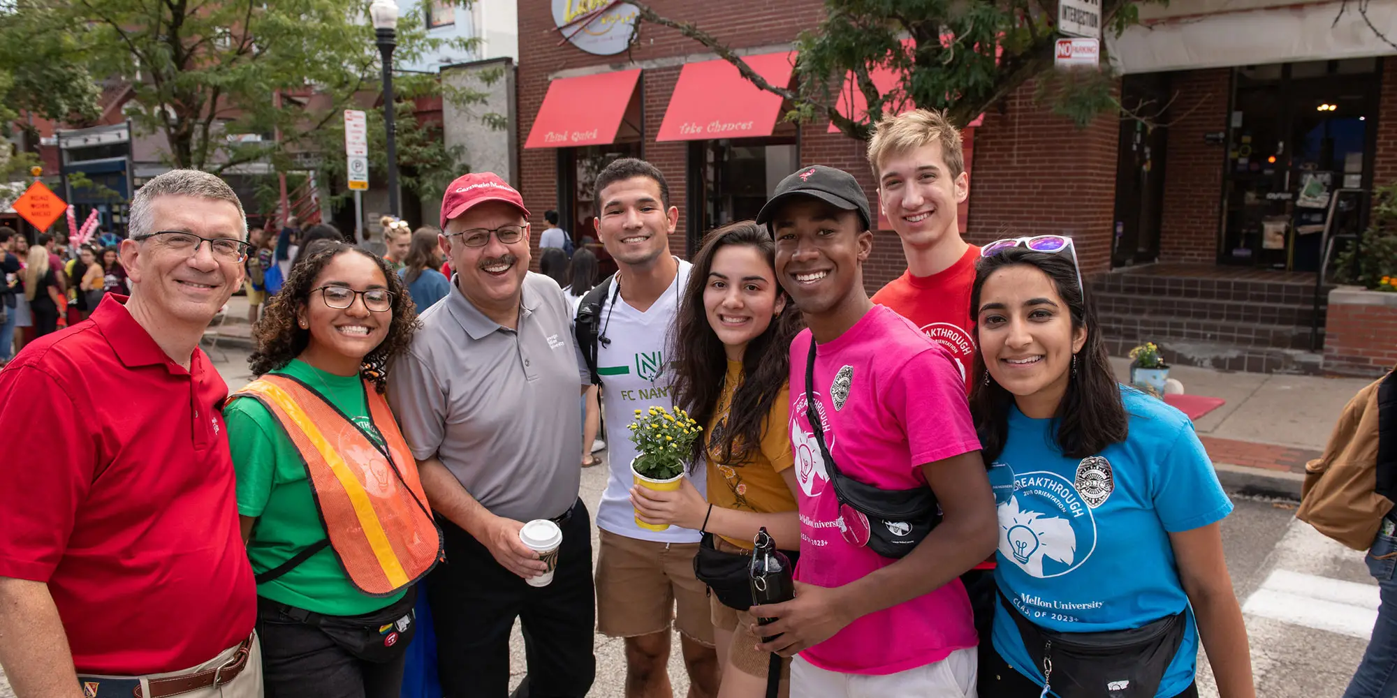 Students in a group with President Farnam and Provost Garrett during the Craig Street Crawl.