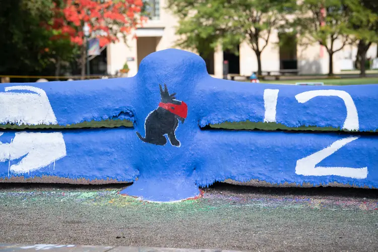 Mascot Scotty is painted on Carnegie Mellon University's Fence