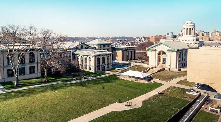 Campus quad photo with tent