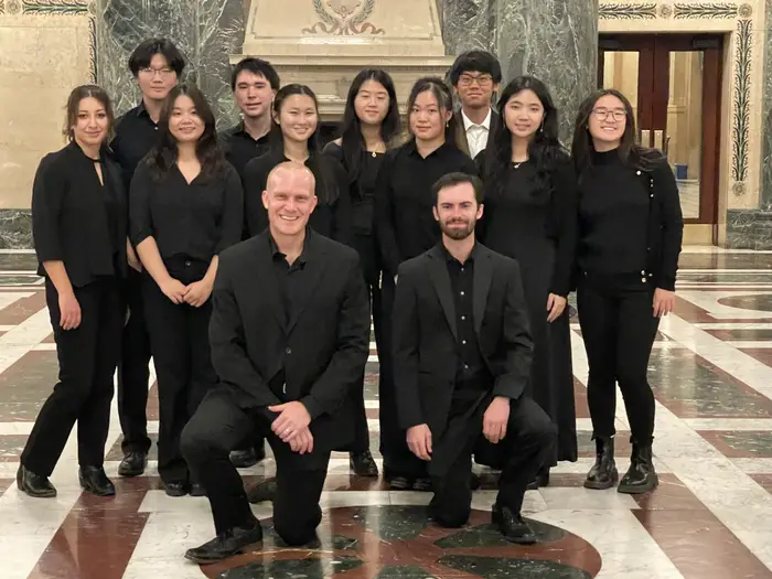 LiLi and her club members pose for a photo