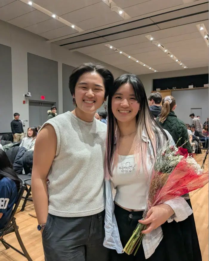 Angie and friend pose for a photo