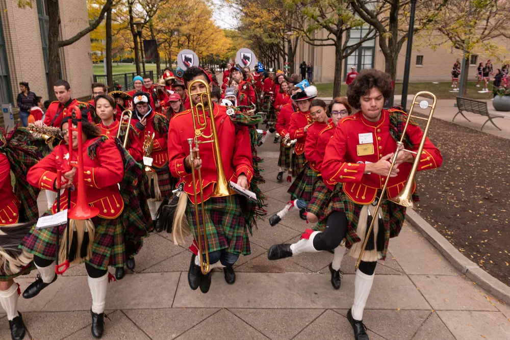 Kiltie Band marching during Homecoming.