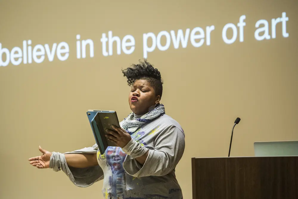 Citizen artist Vanessa German performing at the Blackness, Citizenship and the Arts symposium.