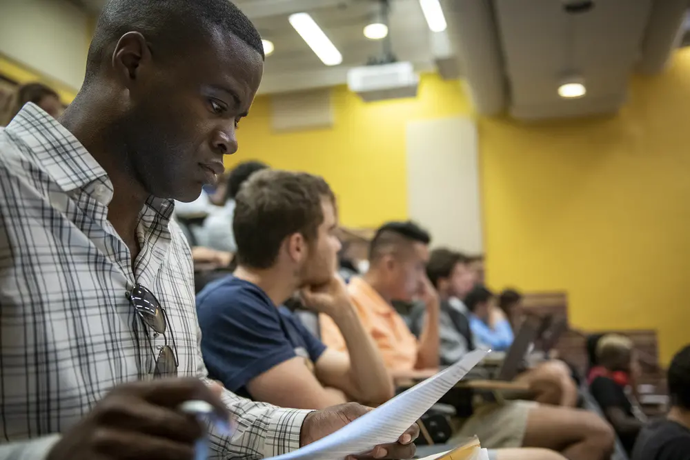 Students listening to a philosophy lecture