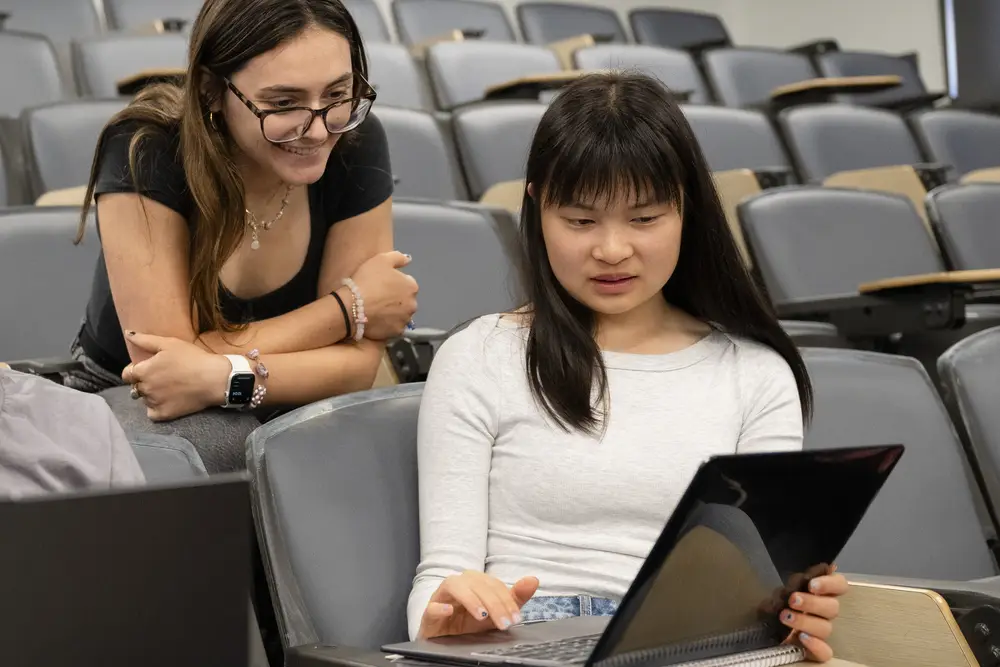 Students collaborating in a lecture hall