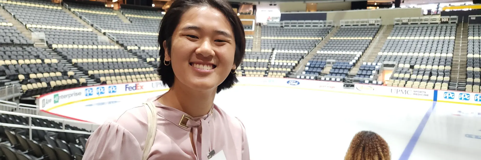 Annie visiting PPG Arena, home of the Pittsburgh Penguins, to learn all about their business operations.