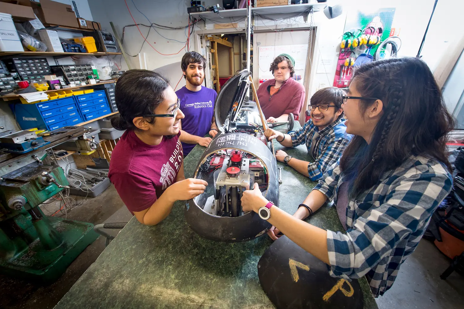 Students engineering for buggy