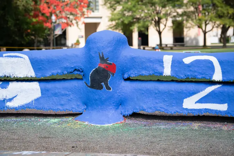 Mascot Scotty is painted on Carnegie Mellon University's Fence