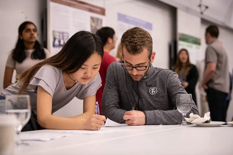 students collaborating at a table