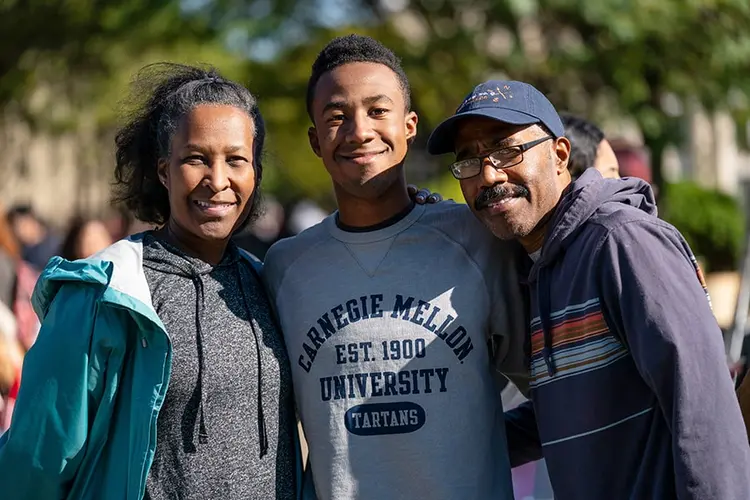 student with his parents