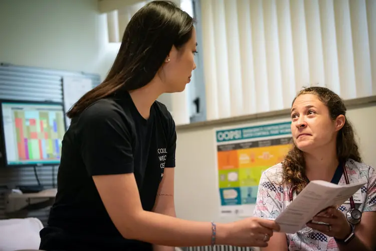 A student meets with a health provider at Health Services