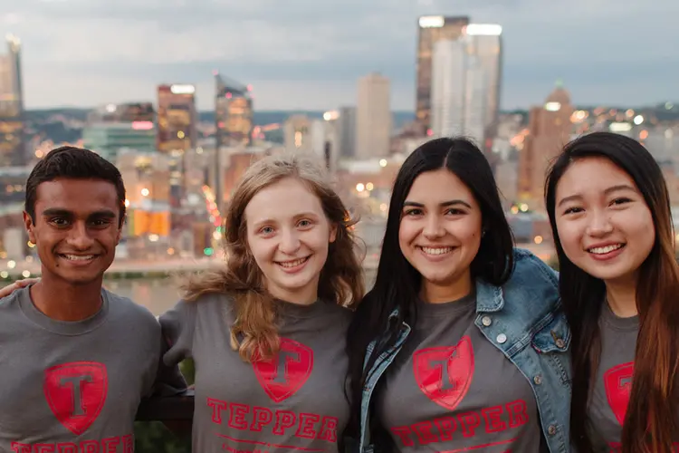 CMU Tepper School fo Business students on Mt. Washington overlooking the Pittsburgh city skyline