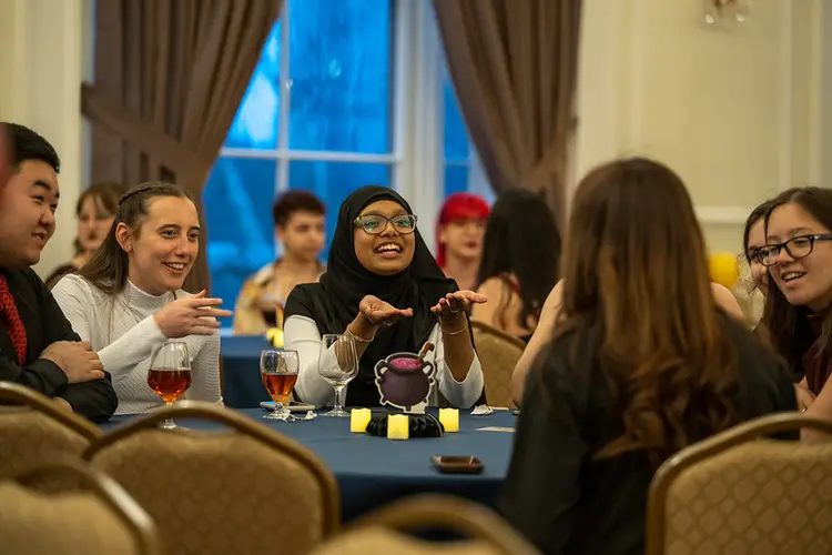Students talking at the MCS ball