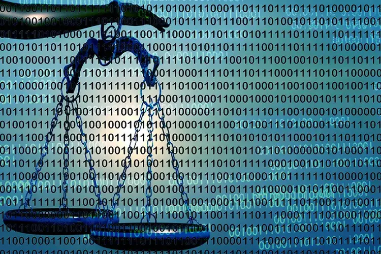 Scales of justice overlaid on binary code