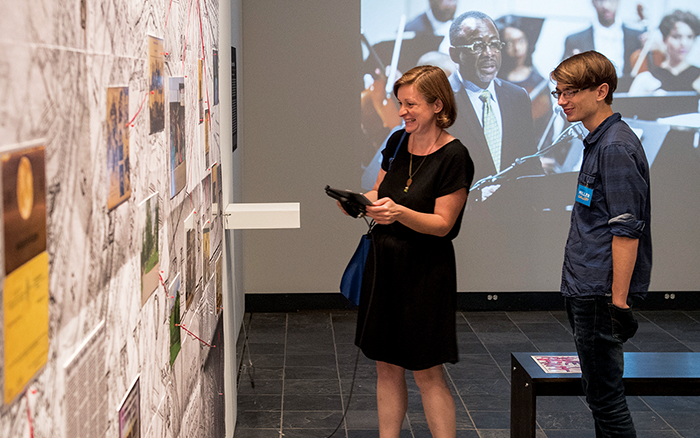 Guests enjoy an exhibit at the Miller Institute for Contemporary Art